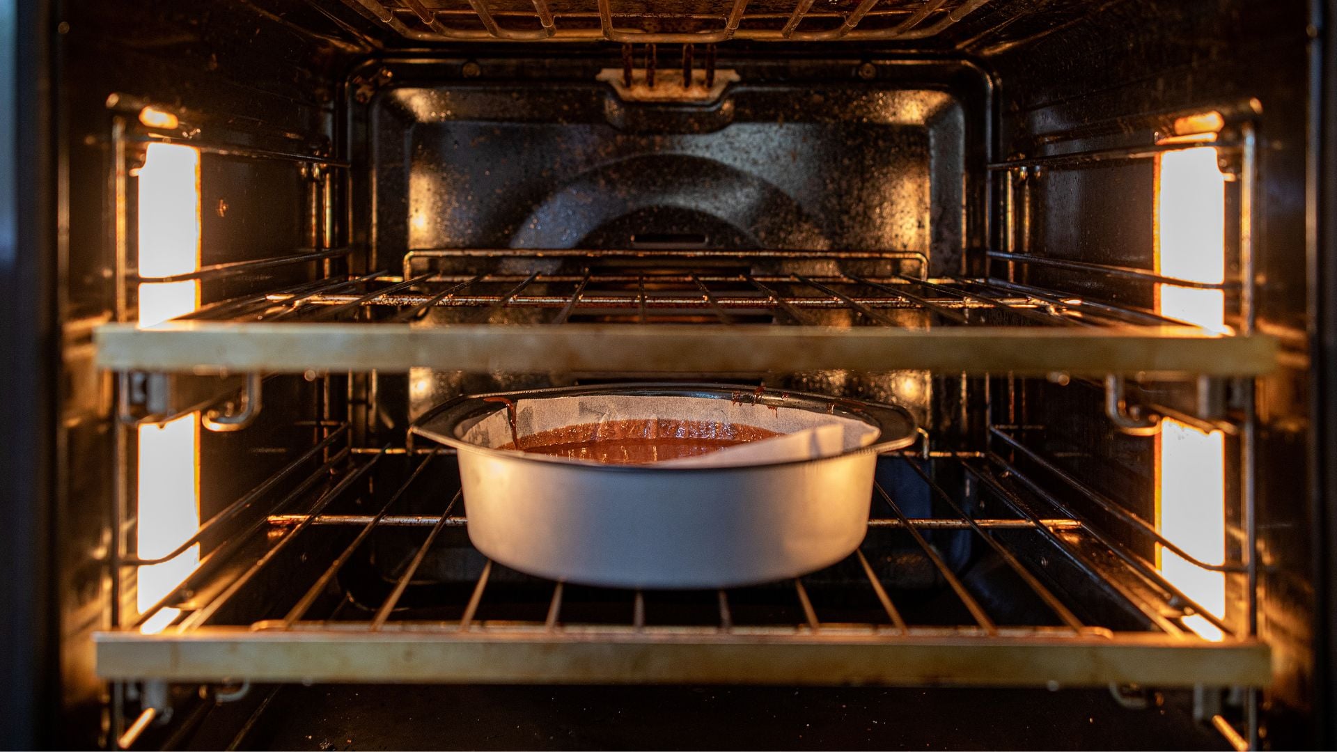 A casserole being baked in an oven